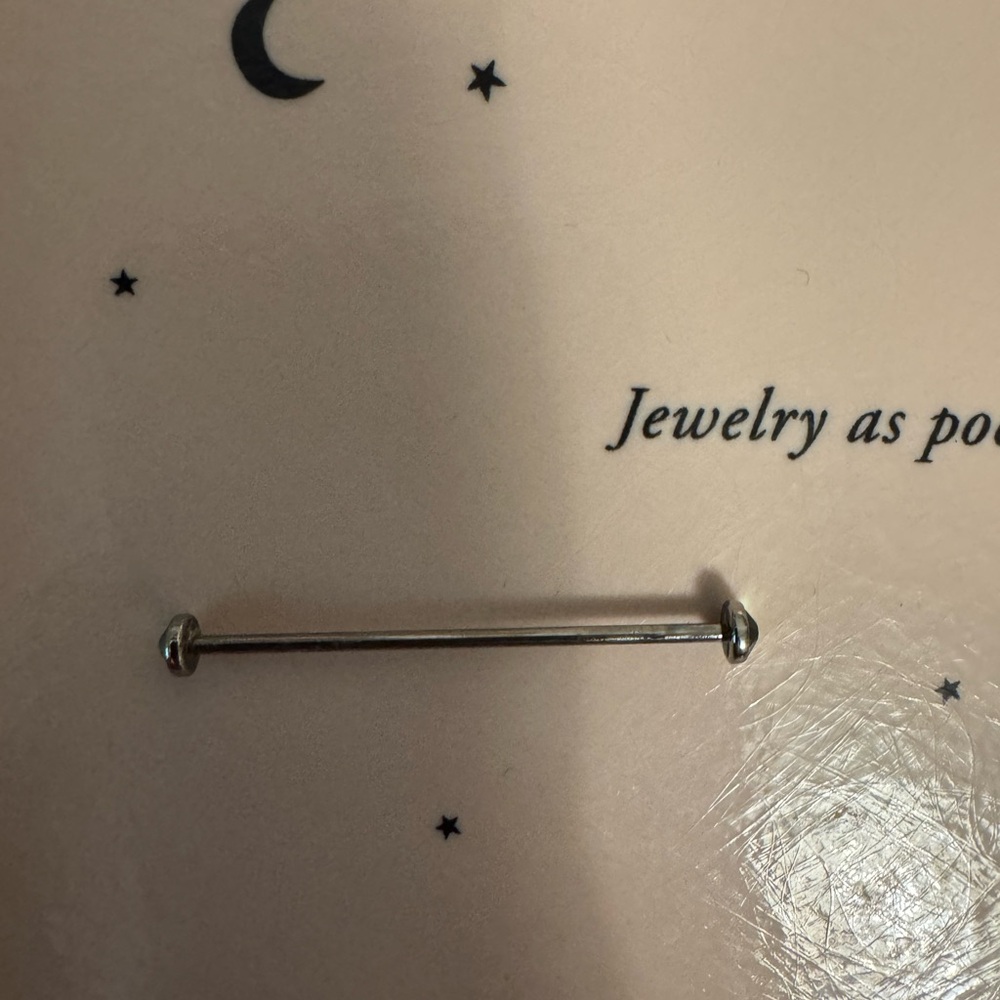 Titanium industrial earing.